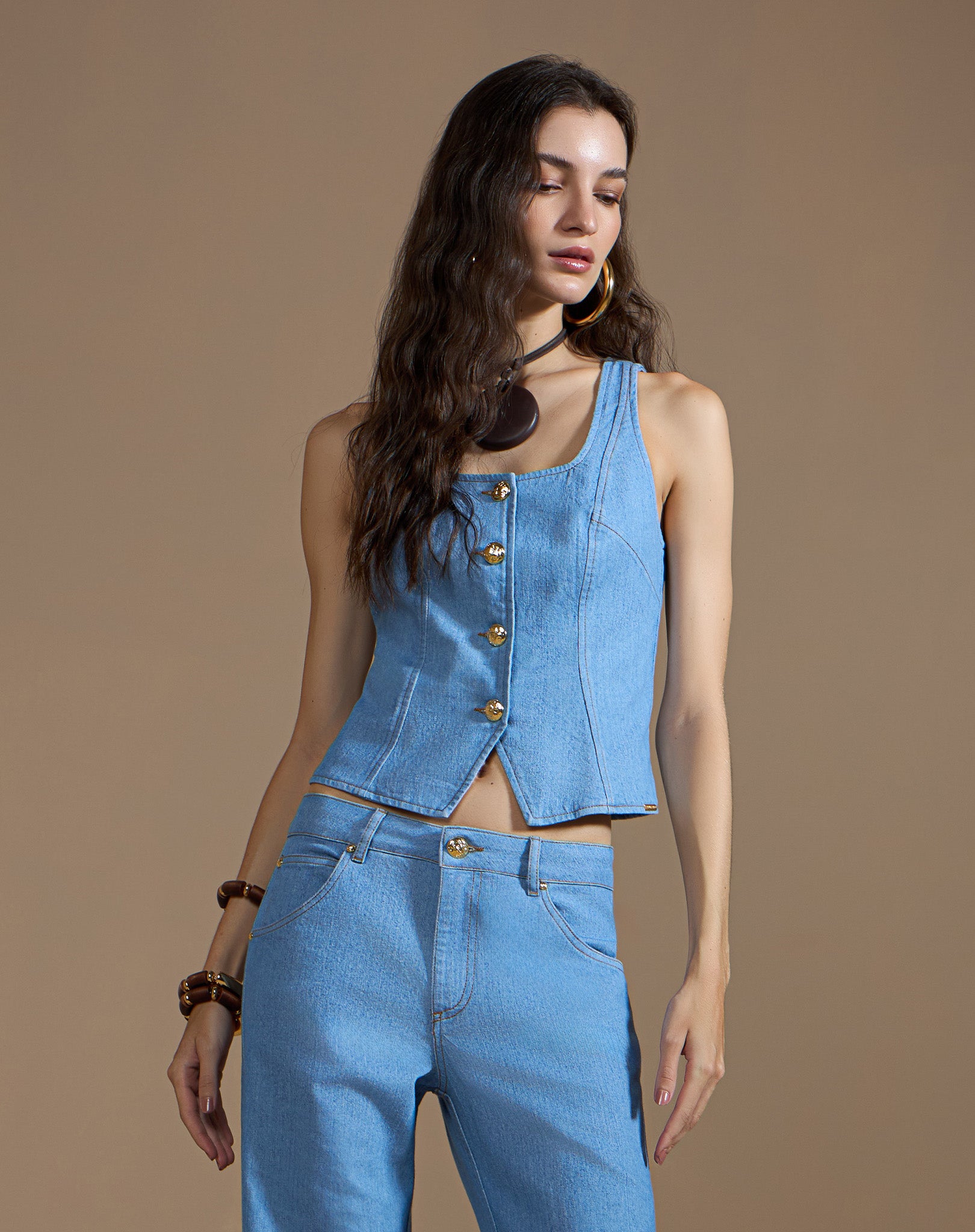 Blusa Jeans Estilo Colete com Regulador nas Costas