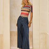 Calça Jeans Pantalona Metal nos Bolsos
