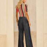 Calça Jeans Pantalona Metal nos Bolsos